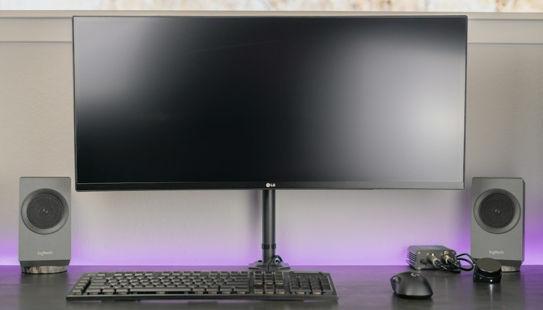 Dual monitor editing workstation showing a color grading timeline
