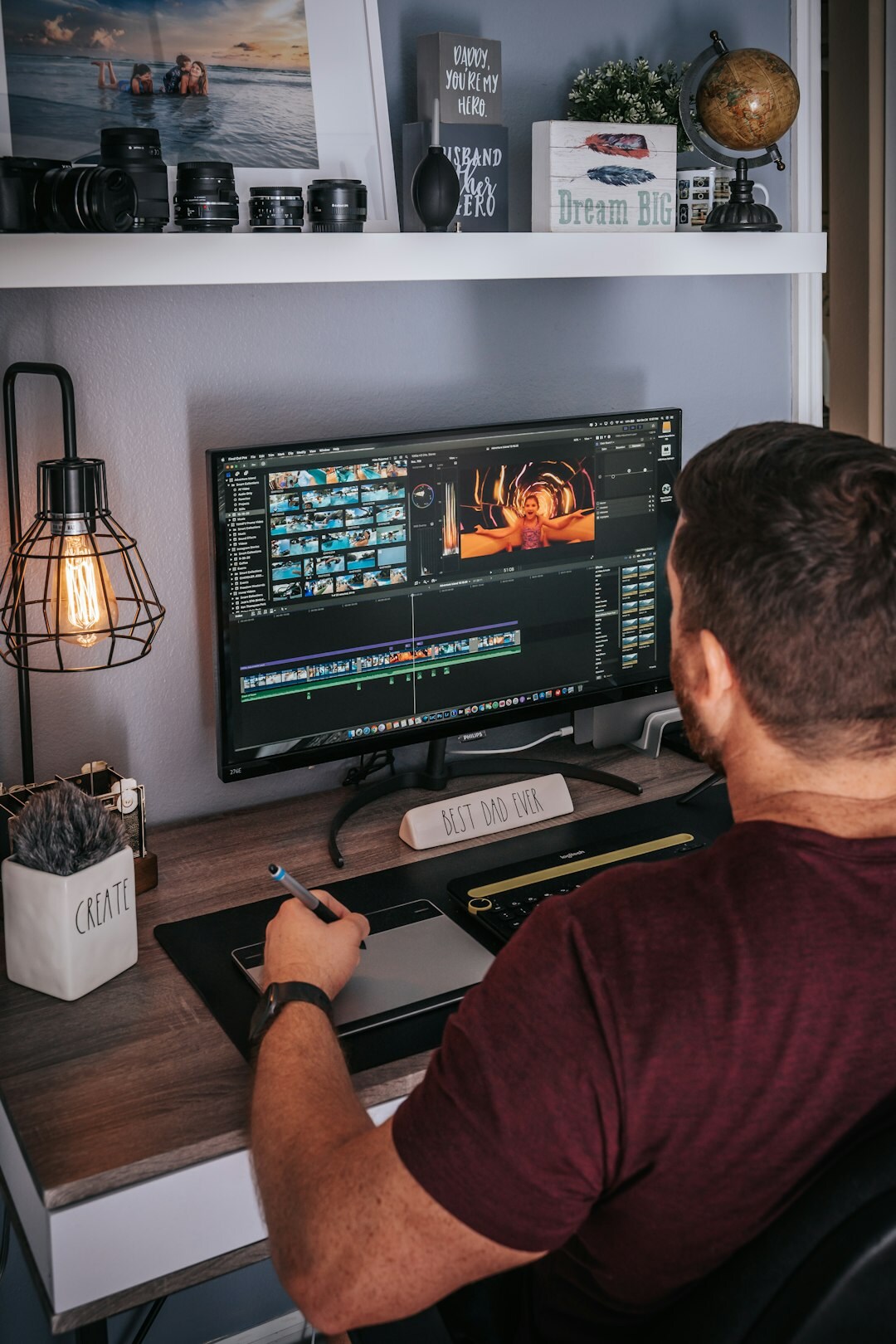 professional video editor at computer